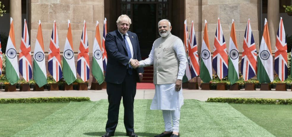  Prime Minister Shri Narendra Modi greets Rt. Hon'ble Boris Johnson MP, Prime Minister of United Kingdom